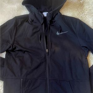 Small black Nike sweater.